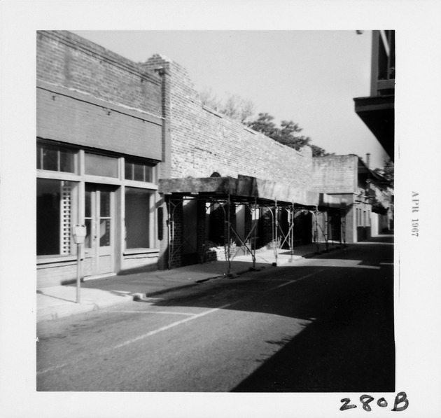 View prior to demolition and construction of Benet Store from St. George Street, looking Northwest, 1967