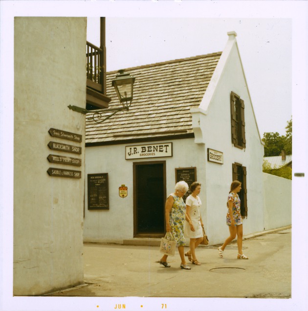 Benet Store from the corner of Cuna Street and St. George Street, also showing the wayfinding signage on the north side of the Benet House, looking Southwest, 1971