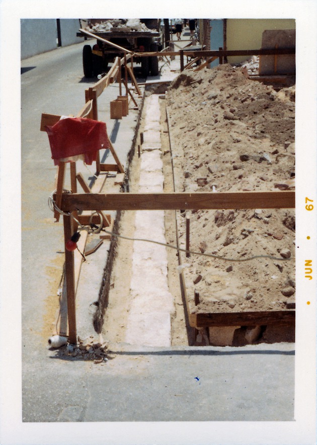 Construction of the Benet Store, exposing the eastern edge of the original foundations, looking South, 1967