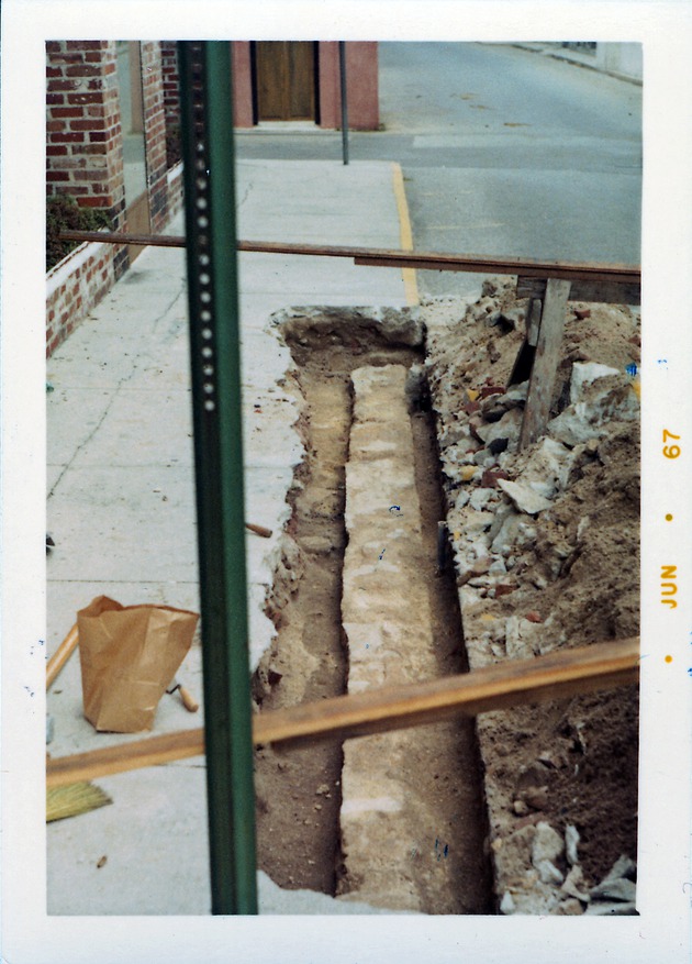 Construction of the Benet Store, exposing the eastern edge of the original foundations, looking North, 1967