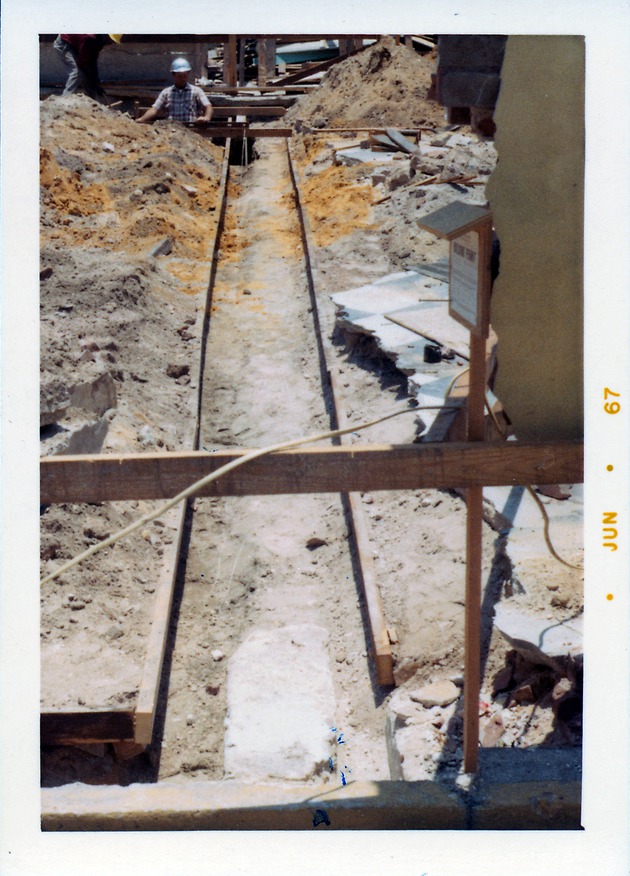 Construction of the Benet Store, exposing the western edge of the original foundations, looking South, 1967