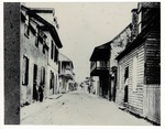 Historic view of St. George Street with Arrivas House on left with balcony, looking North