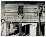 Southwest corner of the Arrivas House during restoration work, looking North, 1961