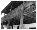 Rot in lumber of the second story balcony on the West side of the Arrivas House, from rear yard, looking Northeast, 1968