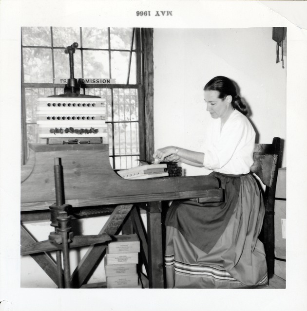 Ann Carling making cigars in the Salcedo House, 1966