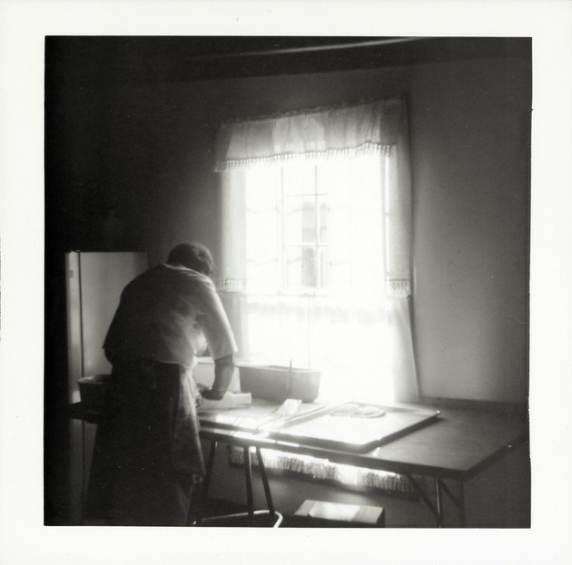 Woman working in the Salcedo Kitchen, 1967