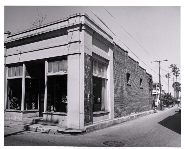 Photograph of the northeast corner of the intersection of St. George Street and Cuna Street, prior to the reconstruction of the Oliveros House, looking Northeast, 1962
