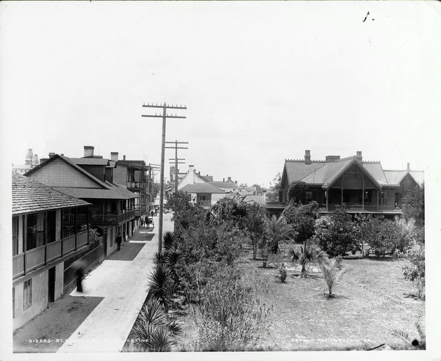 A view down the East side of St. George Street from the intersection with Hypolita Street, with a prominent view of the Lorillard House on the right, looking North