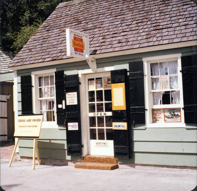 Gift shop for the Oldest Wooden School House, from St. George Street, looking West