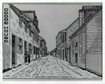 A photograph from a news publication showing St. George Street from in front of the De Mesa Sanchez House (on right, with sign as the Waddill House) looking North, with the Arrivas House on left (with balcony), ca. 1900[?]