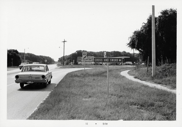 Road sign for the Cross and the Sword from the intersection of A1A and Old Beach Road looking East, 1971
