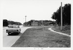 [1971] Road sign for the Cross and the Sword from the intersection of A1A and Old Beach Road looking East, 1971