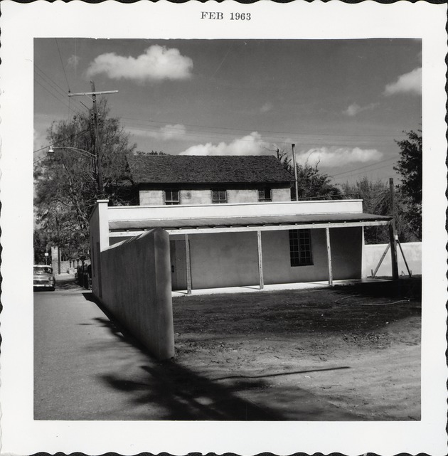 Finished construction of the Gallegos House from St. George Street, looking North, 1963