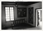 The interior of the Gallegos House a room in the Southeast corner of the house, looking South with the front door in the next room over to the right, 1973