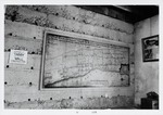 [1973] Exposed tabby wall inside the Gallegos House used to teach visitors about tabby construction, along with a large reproduction of the Rocque Map, looking Northeast, 1973