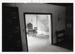 The interior of the Gallegos House, looking through to the Northwest corner of the house, 1973
