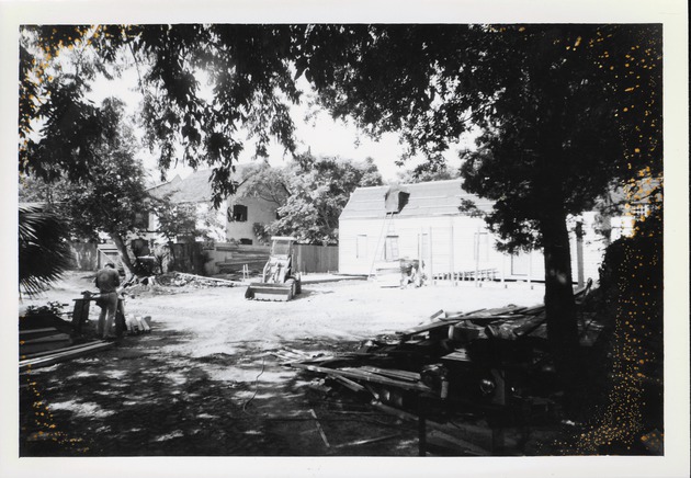 Constructing the Peso de Burgo House and working in the yard, from the Northeast corner of the property, looking Southwest, 1973