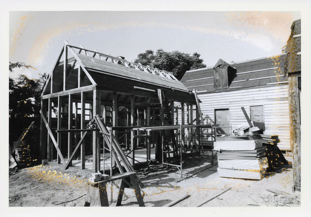 Constructing the South outbuilding behind the Peso de Burgo House, looking Southwest, 1973