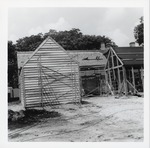 Completing the construction of the South outbuilding behind the Peso de Burgo House, looking West, 1973