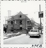 Reconstruction work on the Benet House, rendering the North gable end of the house, from St. George Street looking South, 1964
