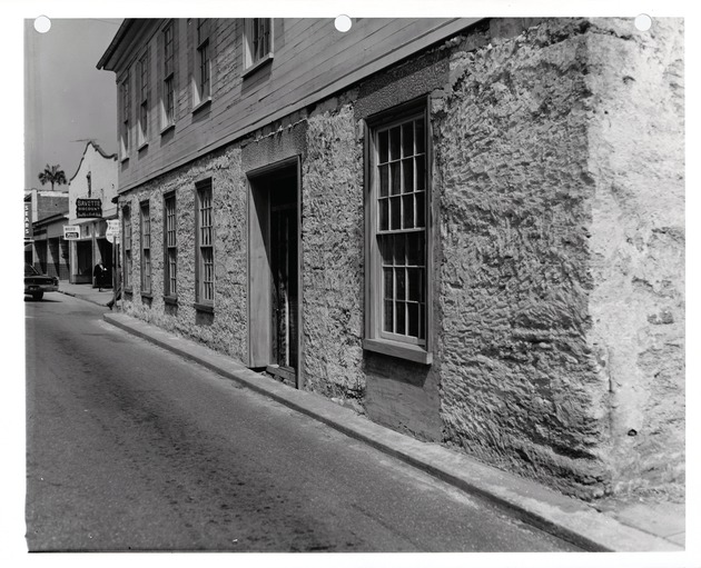 Exposed coquina masonry of the west wall on the first floor of the Peña-Peck House, from St. George Street, looking Northeast, 1969