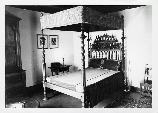 The ornate bed in a bedroom of the De Mesa Sanchez House, 1970