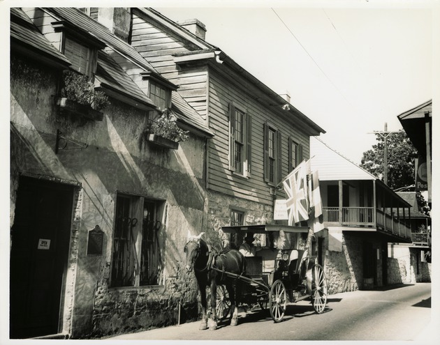 The Parades Dodge House, Rodriguez-Avero Sanchez House, and Arrivas House with horse-drawn carriage in front, view from St. George Street, looking Northwest, ca. 1962