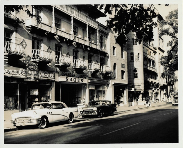 Store fronts along the northern façade of the Cordova Building seen from King Street, looking Southwest, ca. 1960