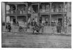 Patrons of the Sunnyside Hotel standing on the porches, balconies, and in front of the hotel, ca. 1880
