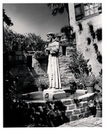 [1960] Statue of St. Francis of Assisi, made in Italy, in the courtyard of the Oldest House , ca 1960