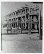 Half of a stereoview showing the southern wing of the Magnolia House from St. George Street, looking Southwest, ca. 1880