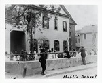 [1900] St. Johns County's first public school on the corner of Aviles (Hospital) Street and Artillery Lane, seen from Avile Street, looking Northwest, ca. 1900