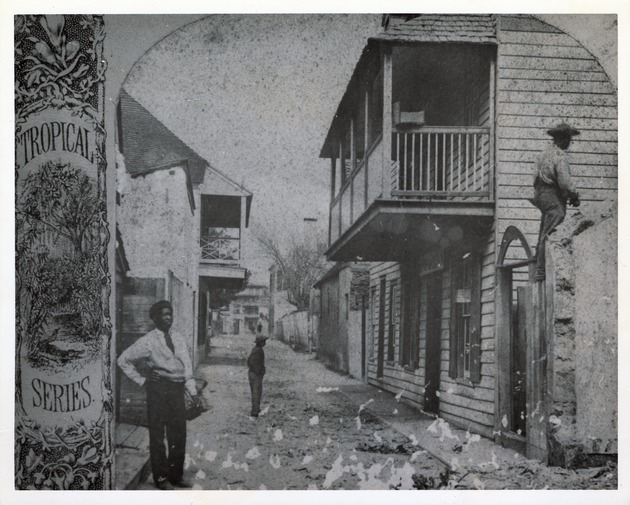 Half of a stereoview of a group of boys playing in Charlotte Street as seen from the intersection with Baya Lane, looking South, ca. 1870