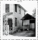 House on Hypolita Street to the west of Weinstein's Grocery, prior to demolition for the construction of the Casa del Hidalgo, looking South, 1964