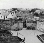 A view over the demilune of the Castillo de San Marcos to the intersection of Avenida Menendez (Bay Street) and Charlotte Street, looking South, ca. 1870-1880