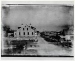 [1888] A view down Bay Street after fire of 1887, with the Carr-Drysdale House in the center and the yacht club on the right, looking North, ca. 1888