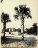 The City Gate at the intersection of Orange Street and Avenida Menendez (Bay Street), looking Northwest, ca. 1930[?]