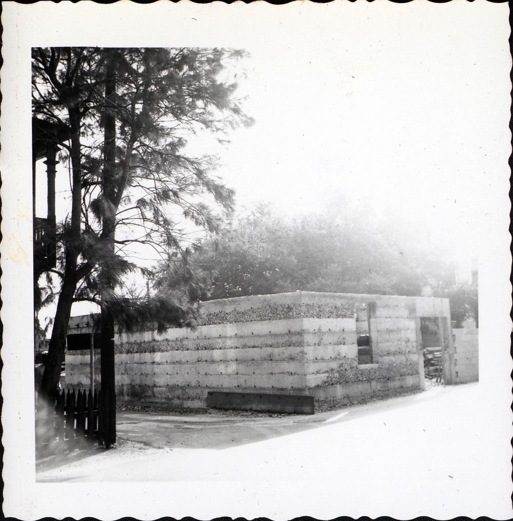 Gallegos House with unfinished poured tabby walls during construction, from the corner of Fort Alley and St. George Street, looking Southeast