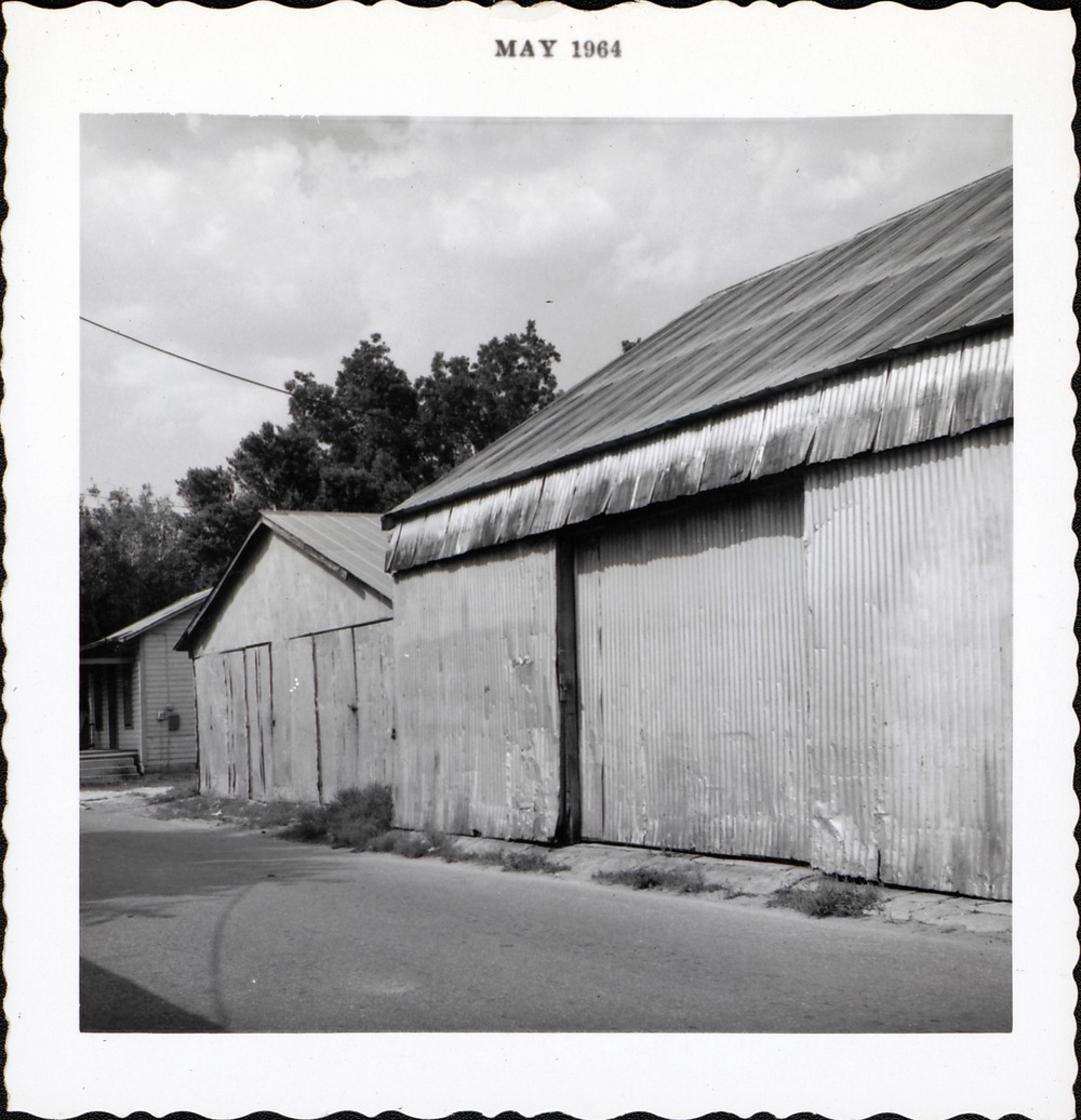 Garages at the back of the Parks Property, seen from Spanish Street, looking Northeast