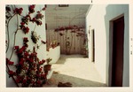 [1968] Walkway between the Ribera House (left) and kitchen (right), looking South