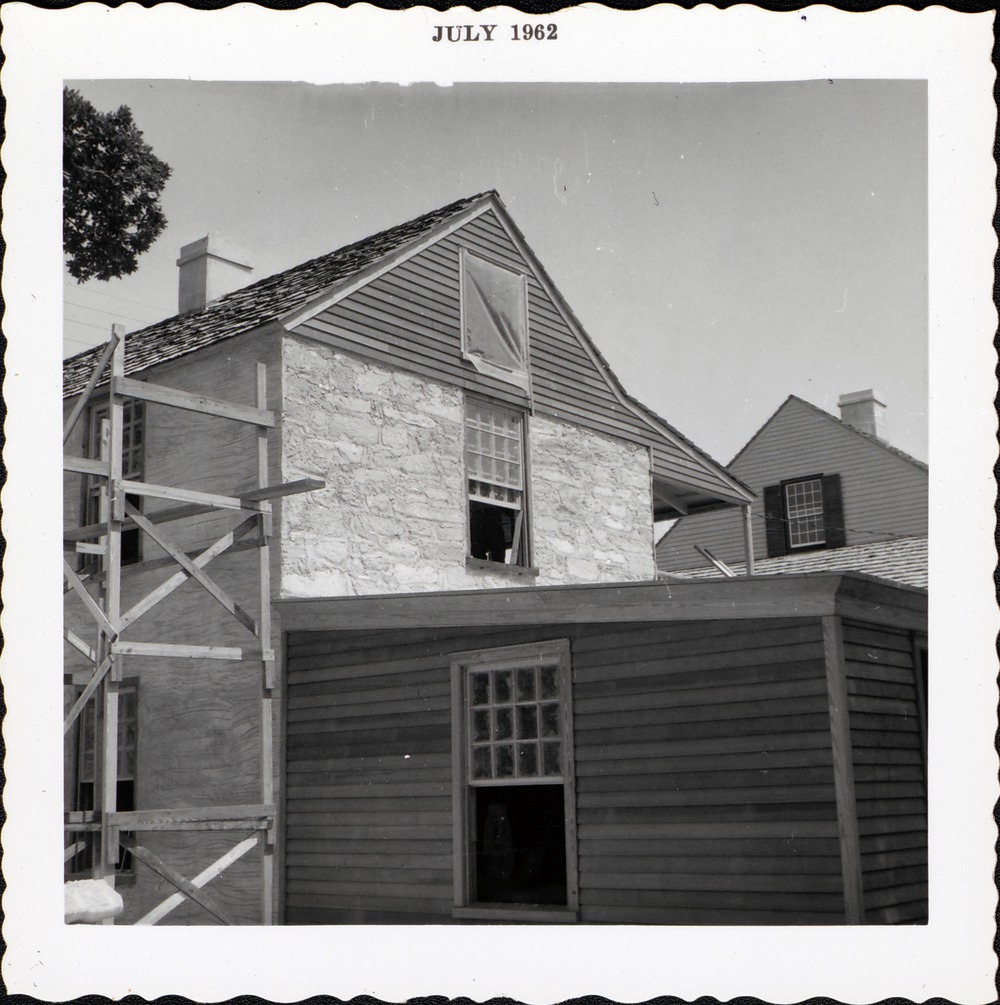 Salcedo House and rear addition (smokehouse), northwest corner, applying render to nothern wall