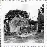 [1962] Salcedo Kitchen construction, finishing southern gabled end, chimney, and roof, looking North