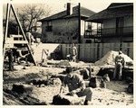 [1962] Bob Steinbach (foreground, center) conducting archaeological excavations, exposing foundational piers of prior structure on Salcedo House lot, looking Southeast, 1962