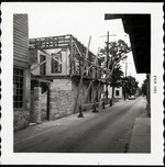 Restoration work on the second story of the Arrivas House from St. George Street, looking North, 196]