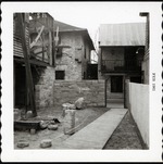 South patio of Arrivas House during restoration, looking East, 1961