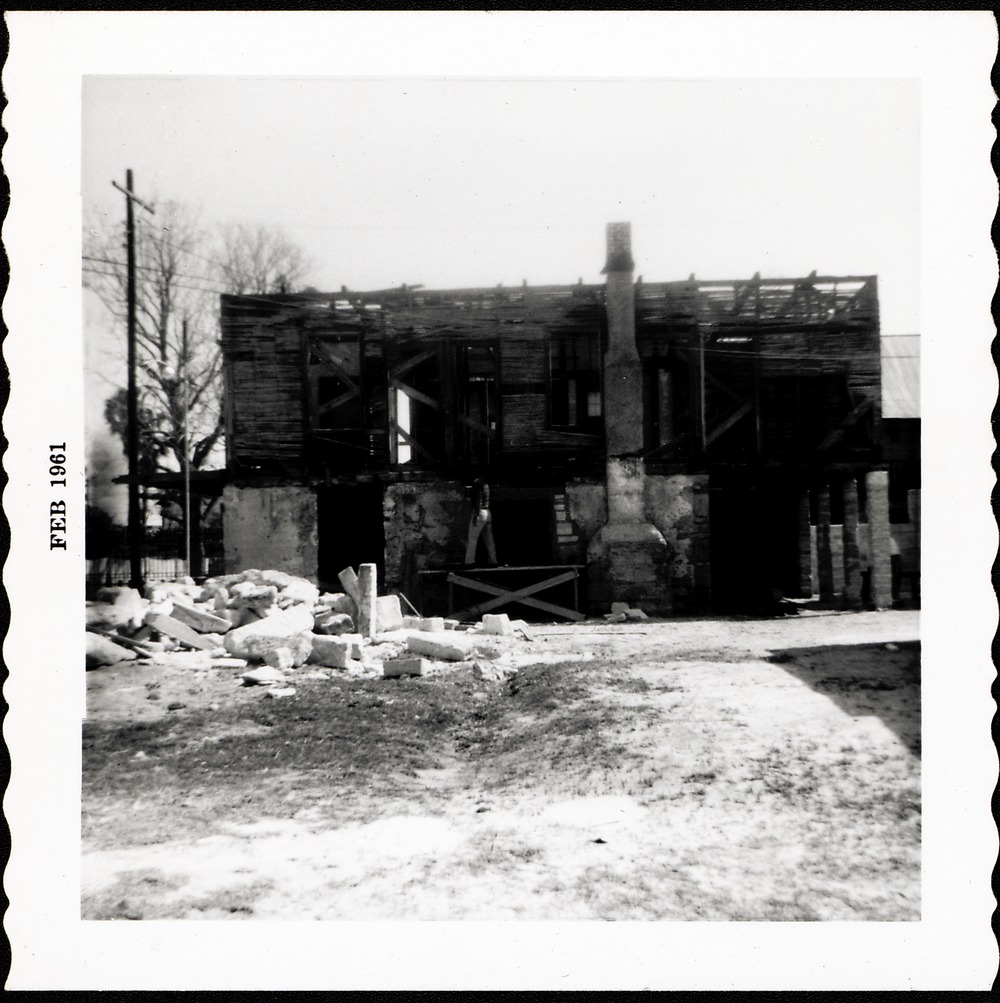 West elevation of Arrivas House, work on the second story during restoration, looking East, 1961