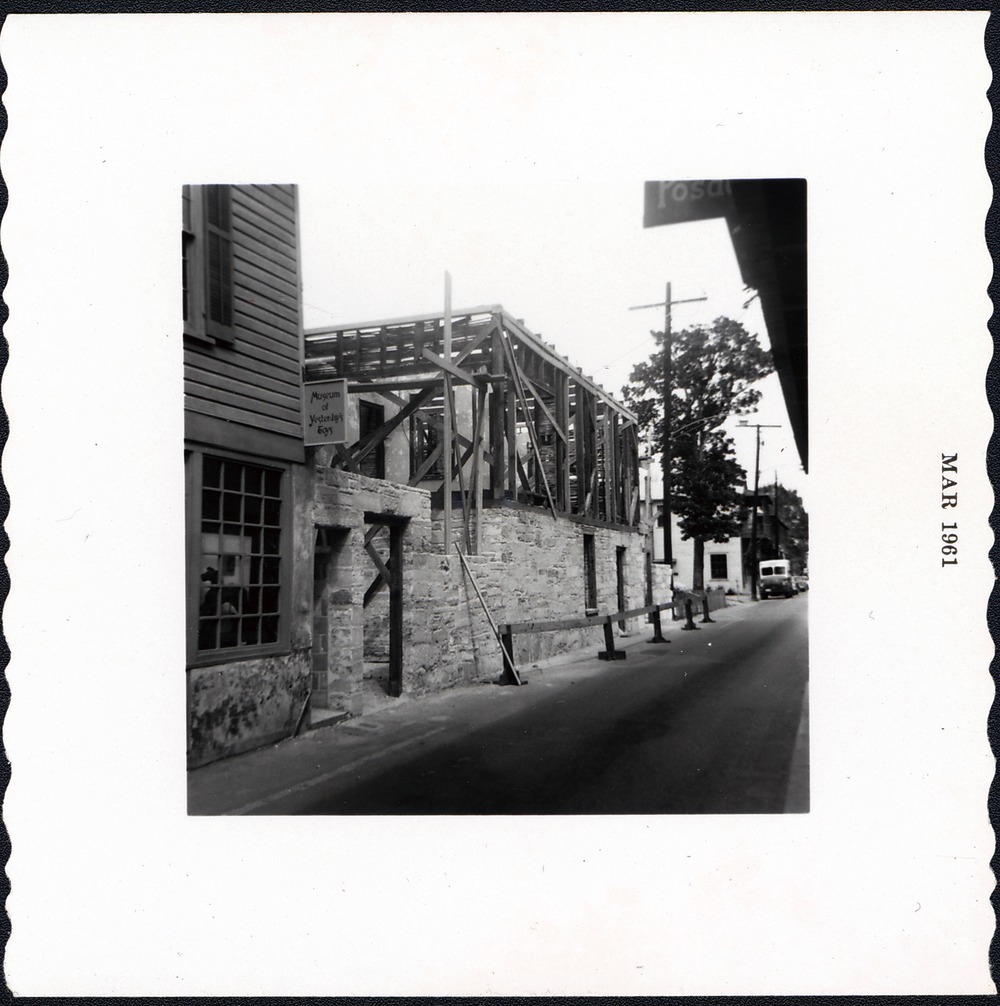 Southeast corner of Arrivas House during restoration with work progressing on second story, looking Northwest, 1961