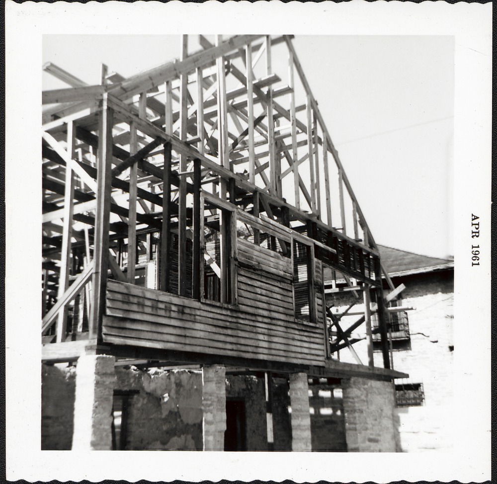 South elevation of Arrivas House, framing the second story gable end during restoration, looking northeast, 1961