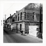 [1961] Northeast corner of Arrivas House during restoration, framing the second-story balcony, looking South, 1961