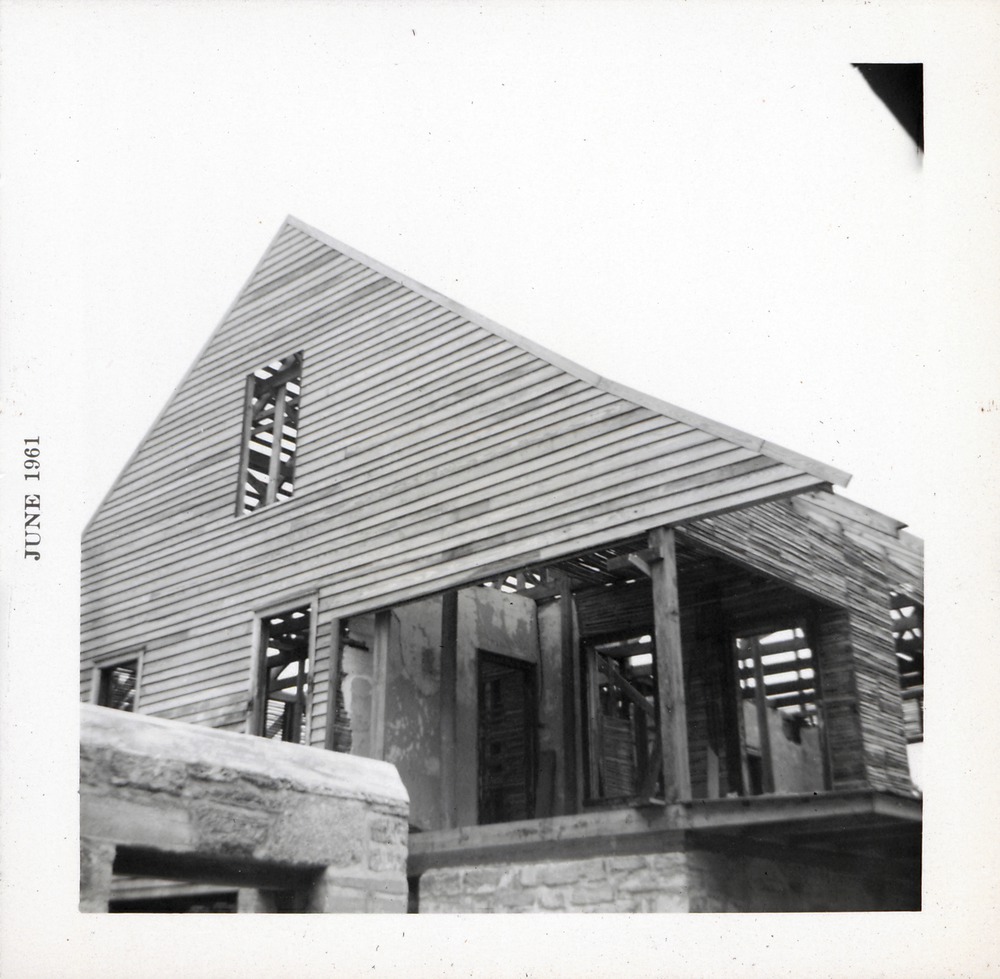 Finishing the southern gable of Arrivas House during restoration, looking Northwest, 1961